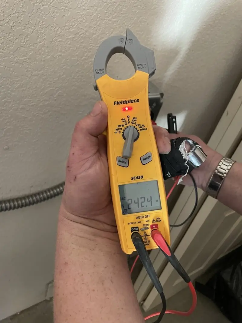 Voltage testing with clamp meter during Hot Tub / Pool Electrical Wiring in Watkinsville